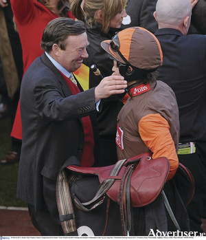 Jockey Sam Wayley-Cohen is congratulated by trainer Nicky Henderson after winning the Cheltenham Gold Cup on Long Run at the  2011 festival.Picture: Matt Browne/SPORTSFILE