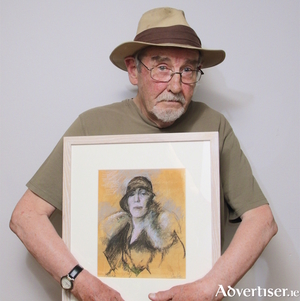 Artist Charles Cullen with his portrait of Nora Barnacle. Photo:- Mike Shaughnessy