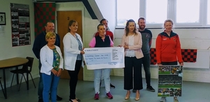 Benny McCarrick, TJ McCarrick, Majella Coffey, Ann Curley, Shane Healy, Grainne Keavney, Sean Gildea, Ciara Buckley at the cheque presentation 