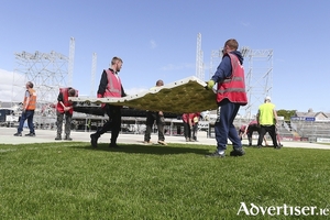 A protective covering is laid on the pitch at Pearse Stadium ahead of Saturday&#039;s concert by The Black Eyed Peas.  Photo:- Mike Shaughnessy