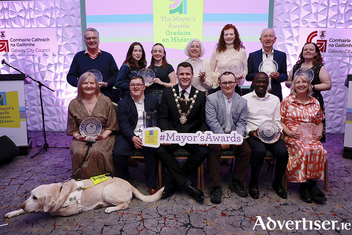 Back row (left to right): Tom Hanley - Ballinfoile Mór Community Garden, Sophie Hynes and Hannah Oliver, Francis Weir - Galway City Women’s Shed, Catriona Crehan, Pat Maddan, Sylvia McDonagh Chairperson - Titans Basketball Club. Front (Left to Right): Marian Maloney and Leon, Sean Ryan - Crewblu Para Rowing, Mayor of Galway City, Cllr. Eddie Hoare, David McAnena - CrewBlu Para Rowing, Innocent Ogah - Africa United Galway and Tina McHugh