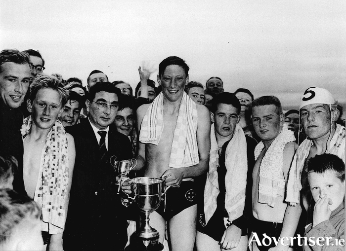Claude Toft presenting the trophy to Michael Brennan from Taylors Hill after the 1958 race. 