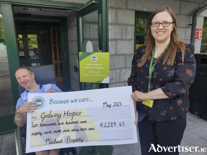 Michael Hegarty presenting the proceeds of his wheelchair push from Roscam to Oranmore and back, to Lorraine Gallagher, Galway Hospice. 
The fundraiser raised €2,289.63 for Galway Hospice.
