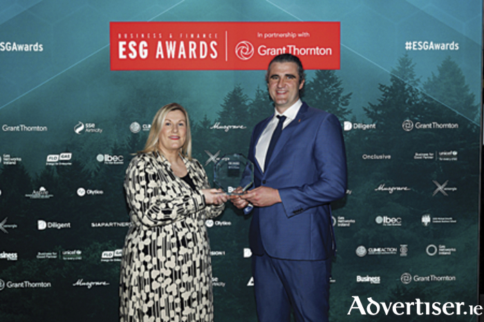 Lisa-Nicole Dunne of Mantra Strategy is pictured presenting the Green Logistics Excellence award to Stephen Tummon, DPD, at the recently hosted  Business & Finance ESG Awards 2024 
