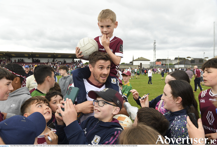 Shane Walsh scored a vital goal for Galway against Westmeath on Sunday, ensuring his side's passage through to the knockout stages of the All-Ireland Championship. 
He is pictured here with his 
nephew Milo Costello, 
aged six.