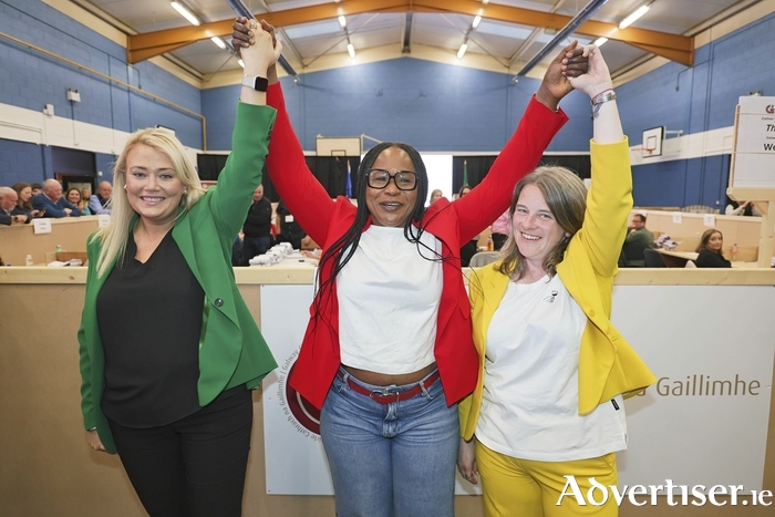Newly elected councillors, Josie Forde (FF), Helen Ogbu (Lab) and Eibhlín Seoighte (SD) at the Count Centre on Sunday. [Photo: Mike Shaughnessy]