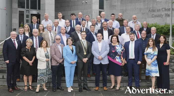 The newly elected Galway county councilors with Galway County Council CEO Liam Conneally and officials outside Galway County Buildings on Friday. Photo: Mike Shaughnessy.