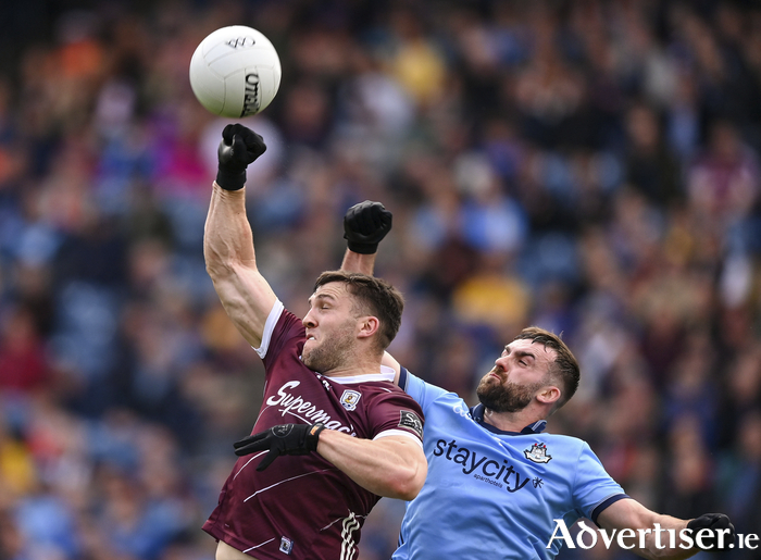 Damien Comer of Galway in action against Sean MacMahon of Dublin.  Photo by Stephen McCarthy/Sportsfile