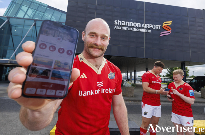 Munster Rugby players, from left: Oli Jager, Fineen Wycherley and Ethan Coughlan at Shannon Airport for the launch of the airport's new mobile app. Photo: Arthur Ellis.