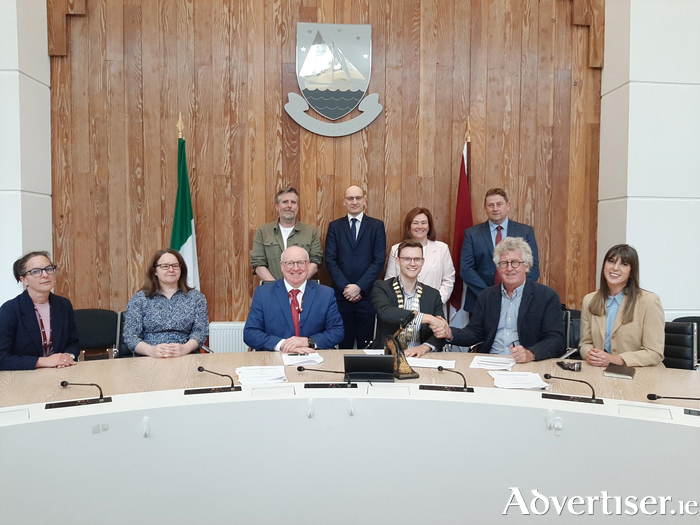 Pictured at Áras an Chontae for the Design-Build contract signing for two housing developments in Athenry (back L-R) Alan Brogan (Executive Engineer), Michael Owens (Director of Services), Liadhan Keady (Administrative Officer) and Damien Mitchell (Senior Engineer) of Galway County Council (front L-R) Angela Spelman (Administrative Officer), Eithne Murphy (Senior Executive Engineer), Liam Conneally (Chief Executive) and Councillor Alan Dolan (Cathaoirleach) of Galway County Council, and Paul Keogh and Ellen Mathews of Studio PKA. Photo Galway County Council.