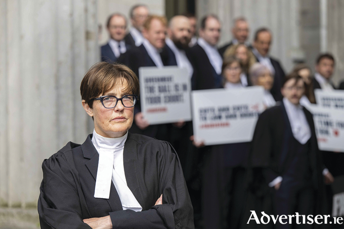 Protests took place at five courthouses on Monday as part of a nationwide withdrawal of service by criminal barristers, in response to a lack of progress on fee restoration. Deirdre Browne BL, is pictured at the courthouse in Galway city with local members of the criminal bar.
Photo:Andrew Downes,xposure