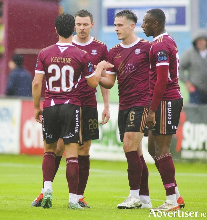 Galway United's goal scorer Maurice Nugent is congratulated by teammates and fellow scorers Jimmy Keohane (6) and Francely Lomboto (19) during the Sports Direct Men’s FAI Cup tie against Longford Town at Eamonn Deacy Park on Friday night. Photo: Mike Shaughnessy 