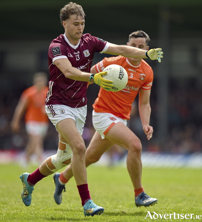 Rob Finnerty of Galway in action against Aaron McKay of Armagh.