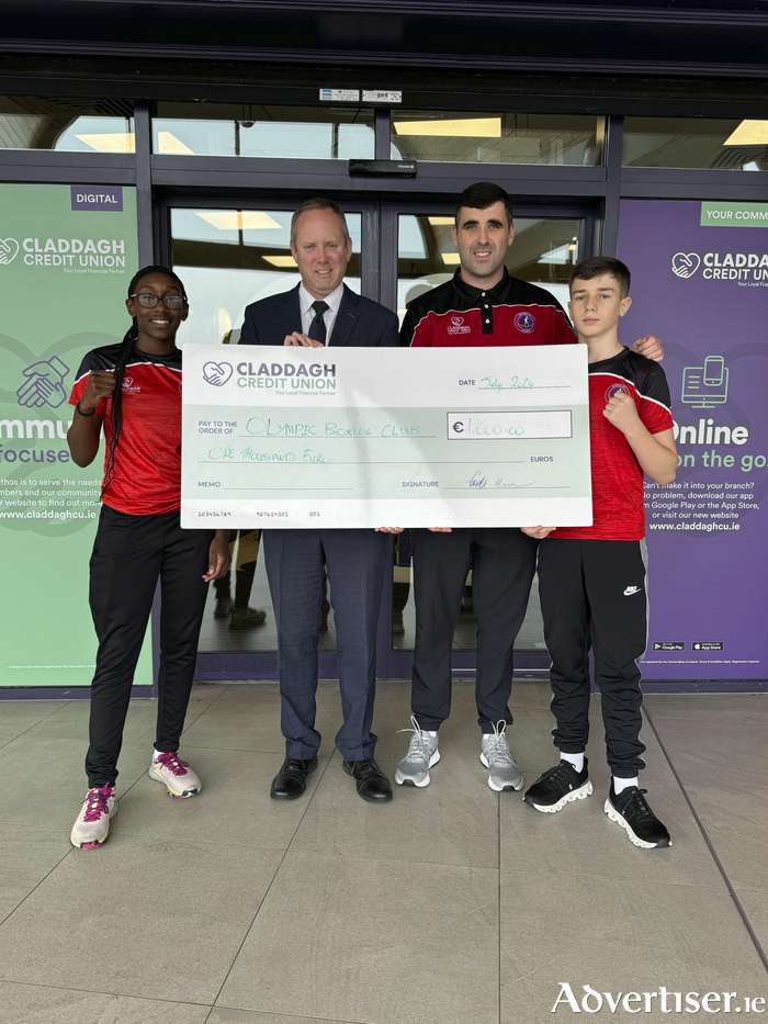 Ruth Dossen (boxer at Olympic Boxing Club), Ted Coyle (Depute CEO of Claddagh Credit Union), Michael Maughan (head coach at Olympic Boxing Club) and Francis Maughan (boxer at Olympic Boxing Club)
