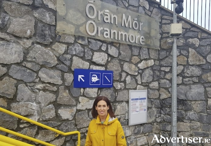 Minister Naughton pictured at the train station in Oranmore.