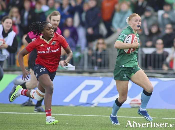 Connacht’s Laoise McGonagle goes on the attack and is chased by Munster’s Chisom Ugwueru. Photo: Mike Shaughnessy