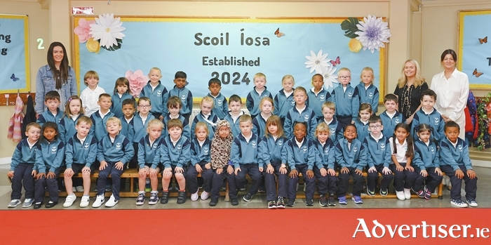 Junior Infant classes with teachers Michelle Quinn and Ruth Conneely and principal Maeve Meeneghan at the start of the new school year for Scoil Íósa, Oranmore. 