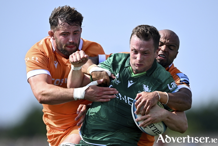 Jack Carty of Connacht is tackled by Tom O'Flaherty, right, and Sam Dugdale of Sale Sharks during the pre-season friendly match between Connacht and Sale Sharks. Photo by Piaras O Midheach/Sportsfile