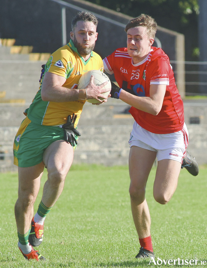 Corofin’s Cormac Greaney and Tuam Stars’ Luke Davin in action from the Bon Secours Hospital Galway Senior Football Championship game at Tuam Stadium on Sunday. Photo: Mike Shaughnessy 