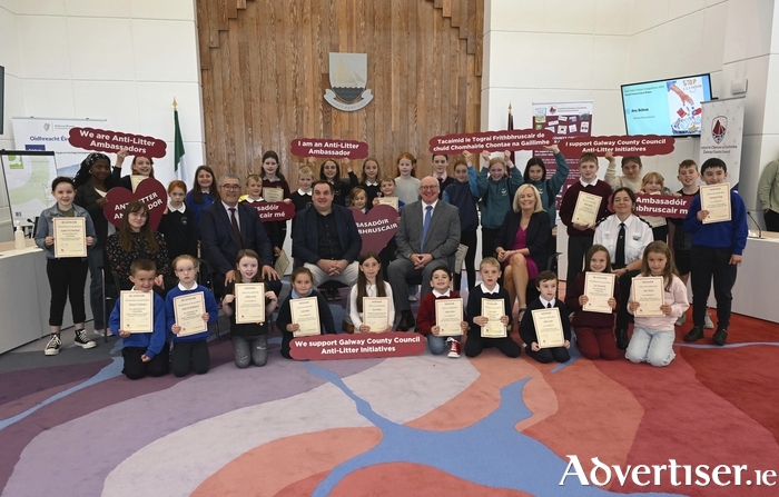 Winners of the Galway County Council Anti-Litter Poster Competition 2024 who became Anti-Litter Ambassadors on the prize giving day pictured with Eve Foley and Mark Molloy of Galway County Council's Environment Section, Leas Cathaoirleach of the County of Galway Councillor Ollie Turner, Chief Executive Liam Conneally and Maria Flynn of the Environment Section. Photo Ray Ryan.