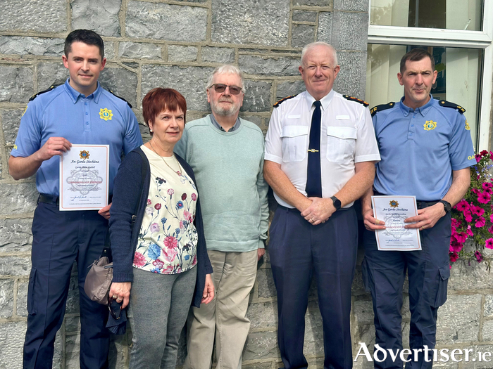 Garda Shane Riddell, Kathleen and Killian Kenny, Chief Superintendent Gerry Roche and Garda Randal Considine.