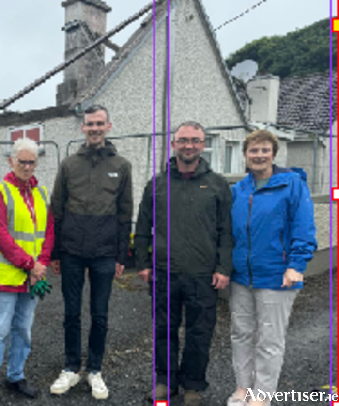 Cllr Alan Harney with members of Ballygar Tidy Towns outside the former health centre in the town. 