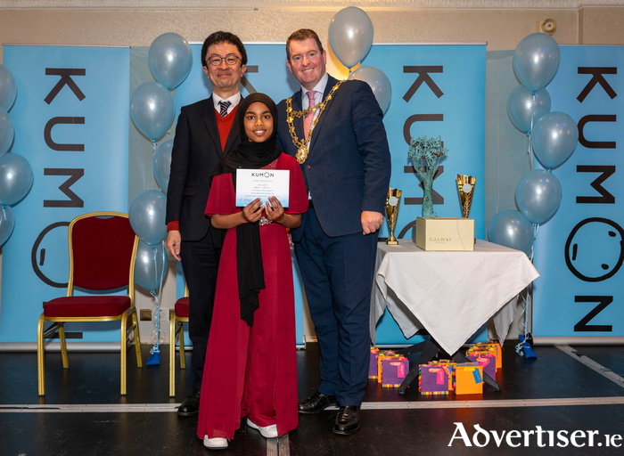 The Mayor of Galway City Cllr Peter Keane with Mr Yohei Seike, deputy general manger Kumon Europe and Africa, and Halima Salah, Maths Certificate at the recent Kumon Galway Awards ceremony at the Menlo Park Hotel. Photo: Murt Fahy.