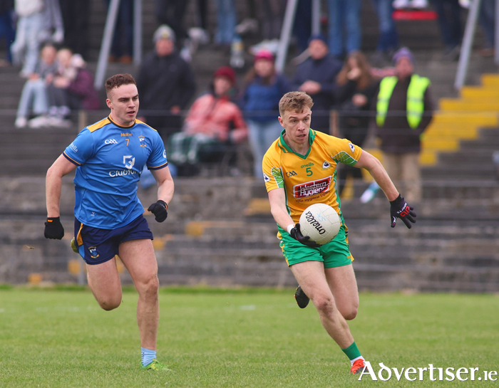 Salthill Knocknacarra’s Daniel O’Flaherty chases Corofin’s Dylan McHugh in action from the Bon Secours Hospital Galway Senior Football semi-final at Tuam Stadium on Sunday. Photo: Mike Shaughnessy