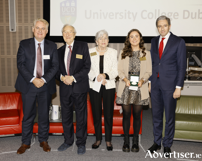 School Rep Terry Fahy, Martin and Carmel Naughton, winning scholar Sharon Dolphin, Yeats College, Galway and An Taoiseach Simon Harris at the Naughton Foundation Scholarship awards held at Trinity Business School, Trinity College Dublin on October 12. Photo: Kieran Harnett.