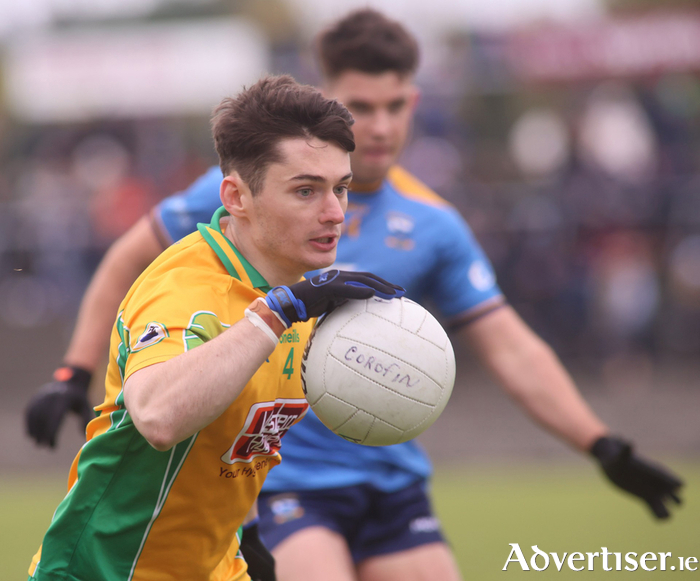 Corofin’s Gavin Burke and Salthill Knocknacarra’s Tomo Culhane in action from the Bon Secours Hospital Galway Senior Football semi-final at Tuam Stadium on Sunday. 
Photo: Mike Shaughnessy