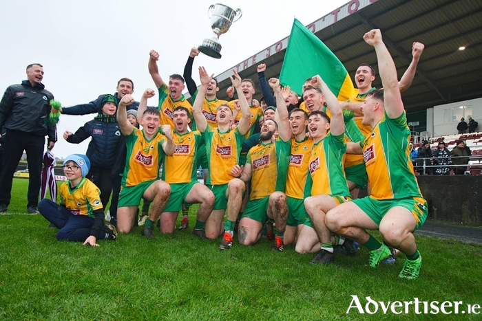 The Corofin team celebrate winning the GAA Galway Senior Football Final at Tuam Stadium on Sunday. Photo: Mike Shaughnessy