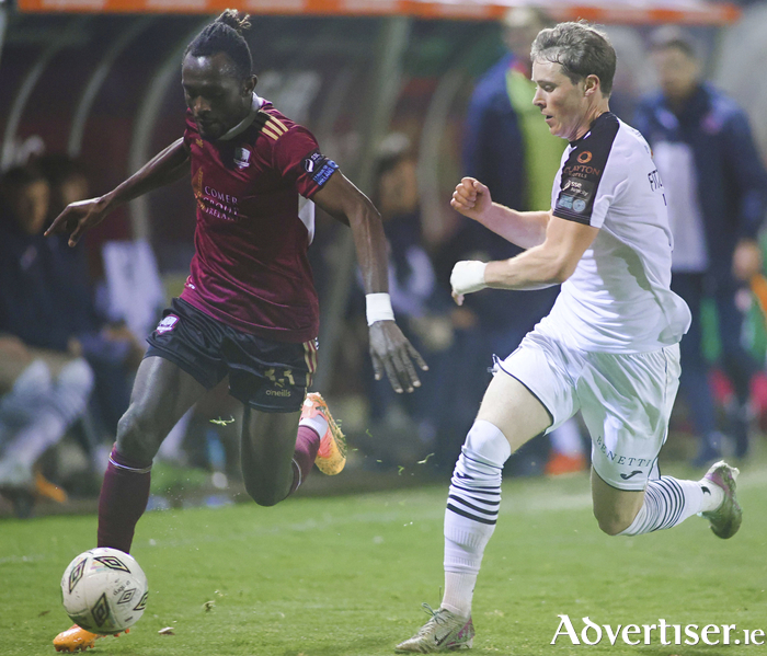 Galway United’s Jeannot Esua and Sligo Rovers’ Will Fitzgerald in action from the SSE Airtricity League of Ireland Premier Division game at Eamonn Deacy Park on Friday night. Photo: Mike Shaughnessy