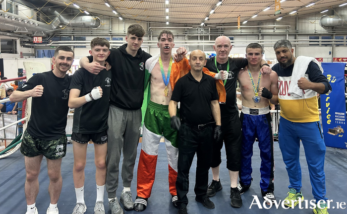 L-R: Oisín Concannon (Barna), Darren Van Strien (Westside), Sean Murray assistant coach (Clonboo), Corey O’Malley (new 67kg World Champion), Referee, Pete Foley (chief coach Annaghdown), Filatov Oleksandr (Ukraine) and the Ukrainian coach. 