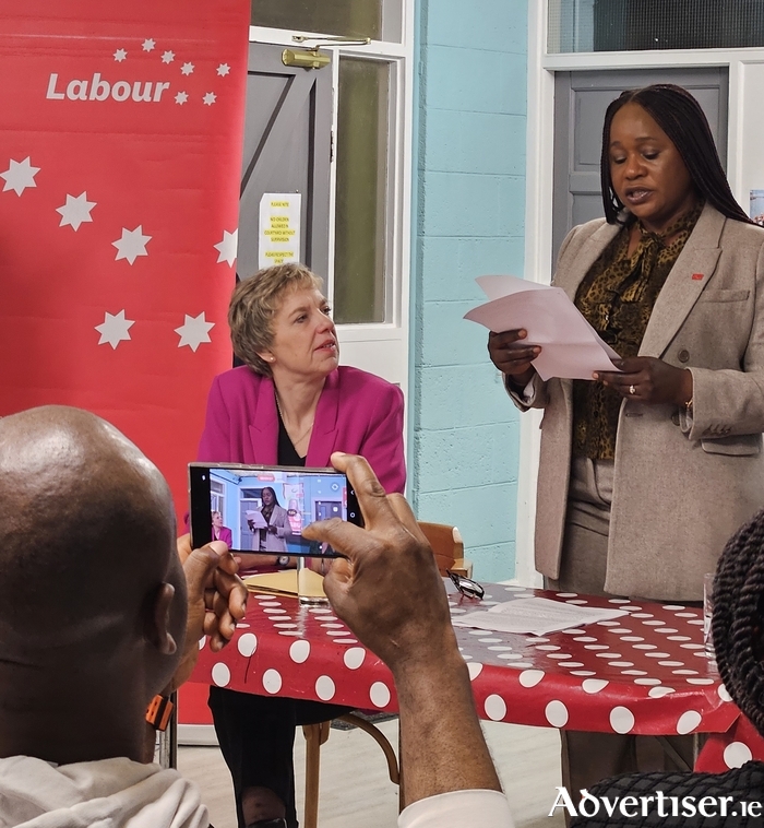 Labour Party leader Ivana Bacik TD listens to general election candidate Cllr Helen Ogbu set out her policy priorities for Galway West in a packed Shantalla Community Centre on Tuesday