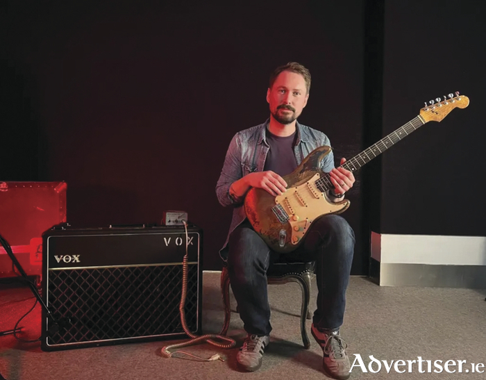 David Hawkins with Rory Gallagher's guitar