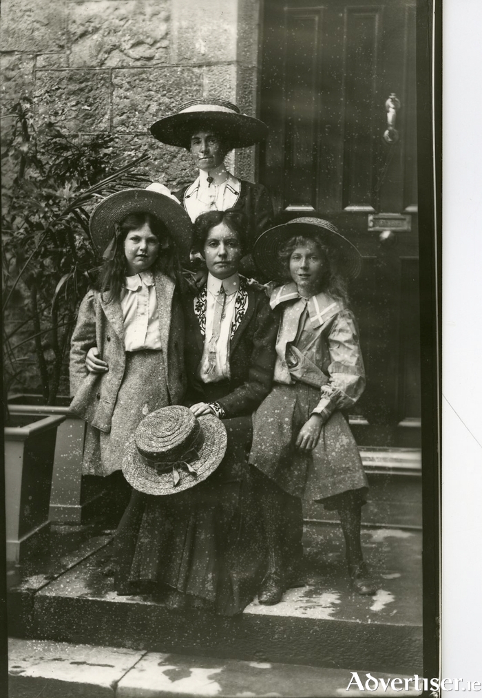 The family of Alexander Anderson, Irish physicist and President of Queen's College Galway (1899-1934), including Emily Anderson the German Professor and celebrated code-breaker - one of our most renowned graduates, taken in 1904 at the front door of the President's residence at the University. From the College Photographs Collection at the University of Galway Library.