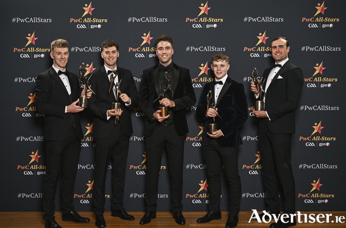 Galway footballers, from left, Dylan McHugh, Rob Finnerty, Paul Conroy, Johnny McGrath and John Maher with their PwC GAA/GPA All-Star Award during the 2024 PwC GAA/GPA All-Star Awards at the RDS in Dublin. Photo by Sam Barnes/Sportsfile 