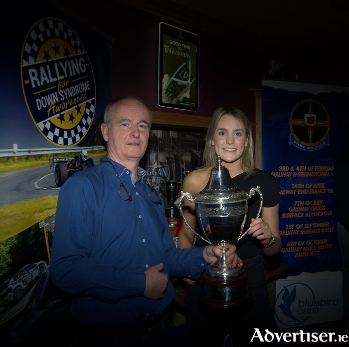 Galway Motor Club President Joe Donoghue presenting the JJ Fleming Perpetual Cup to Aoife Raftery at the club’s awards on Saturday night. Photo: Eoin Stapleton/ Eye-to-Eye Photography