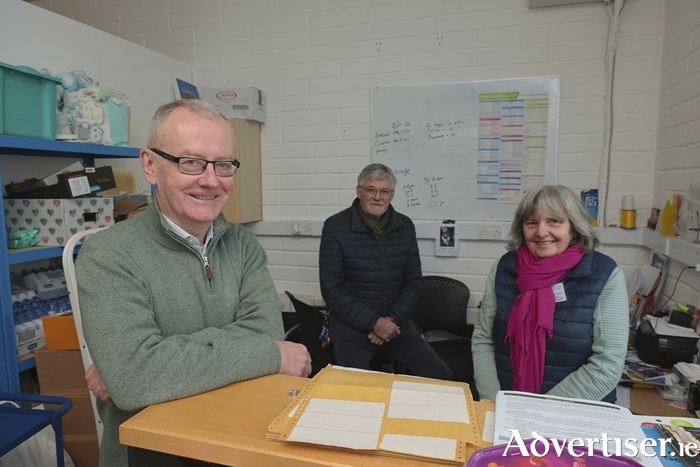 Colm Divilly, incoming president of the Galway area St Vincent de Paul pictured with Seamus McManus, outgoing president, and Marie O’Donovan of the SVP food hub.  Photo: Mike Shaughnessy