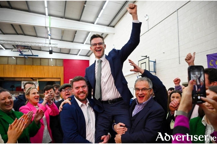 Albert Dolan celebrates after his election.