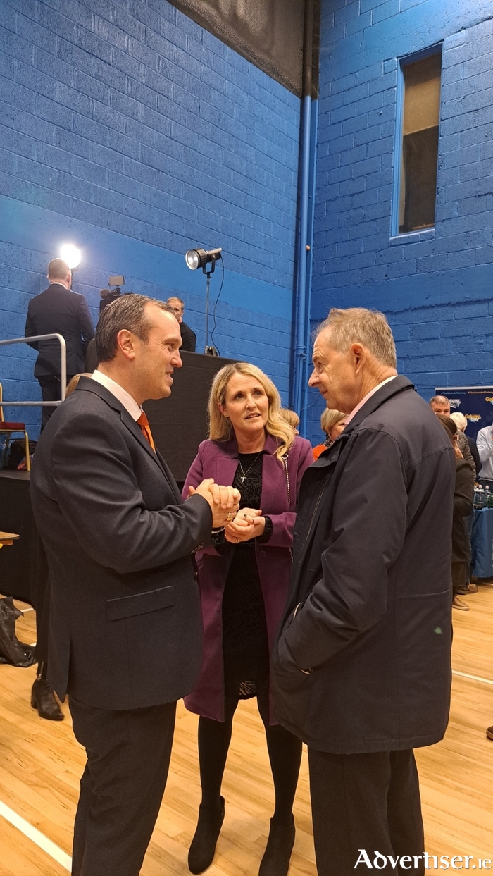 John Connolly with his wife Bernadette talk to outgoing TD Eamon Ó Cuív at Galway West's general election count centre. Photo: Una Sinnott.