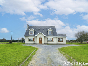 This Aughrim residence boasts ample living and bedroom space. 