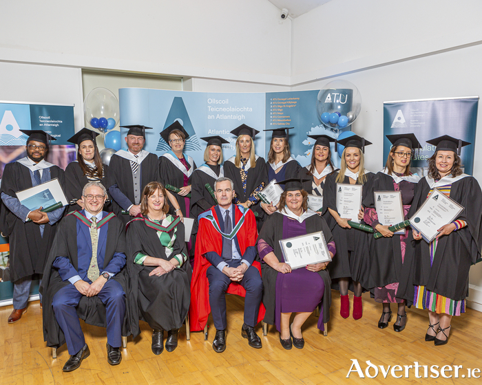 Pictured at the conferrings in ATU Mayo, back row (l-r): Stephen Mudzatsi from Roscam, Co Galway; Eleanor Ryder from Foxford, Co Mayo; Enda Daly from Roscommon; Carmel Gethin from Riverstown, Co Sligo, Kathleen Lenehan from Westport, Co Mayo; Aisling Moroney from Craughwell, Co Galway; Thelma De Paor from Knocknacarra, Galway; Sarah Kelly from Westport, Co Mayo; Donna O’ Grady from Castlebar, Co Mayo; Sanae Needham from Castlebar, Co Mayo; Sinead Quinn from Swinford, Co Mayo. Front row (l-r): Michael Gill, Head of Department of Organisational Development; Caroline Clarke, lecturer and programme chair; Dr Seamus Lennon, head of School of Business; and Noeleen Hussey from Oranmore, Co Galway, graduate and Academic Achievement Award recipient.