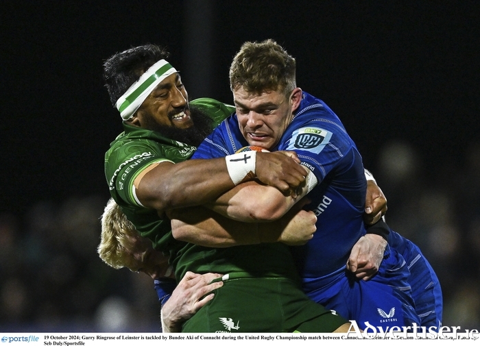 26 October 2024; Bundee Aki of Connacht with supporters after the United Rugby Championship match between Connacht and Dragons at Dexcom Stadium in Galway. Photo by Michael P Ryan/Sportsfile