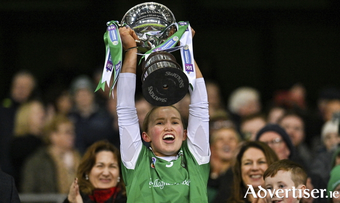 The Sarsfields captain Laura Ward lifts the Bill and Agnes Carroll Cup after the AIB All-Ireland Senior Camogie Club final match between Sarsfields and Truagh-Clonlara at Croke Park in Dublin. Photo by Stephen Marken/Sportsfile