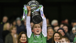 The Sarsfields captain Laura Ward lifts the Bill and Agnes Carroll Cup after the AIB All-Ireland Senior Camogie Club final match between Sarsfields and Truagh-Clonlara at Croke Park in Dublin. Photo by Stephen Marken/Sportsfile