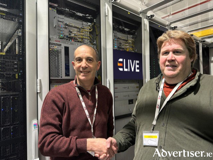 Pictured are Sean Ryan of E-Live and Adam Beecher in CIX DataCentre to agree the acquisition.