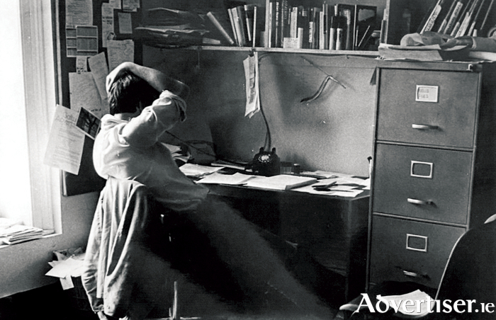 Ronnie O’Gorman pictured at his desk in the Dickensian office at the former Galway Advertiser office. 