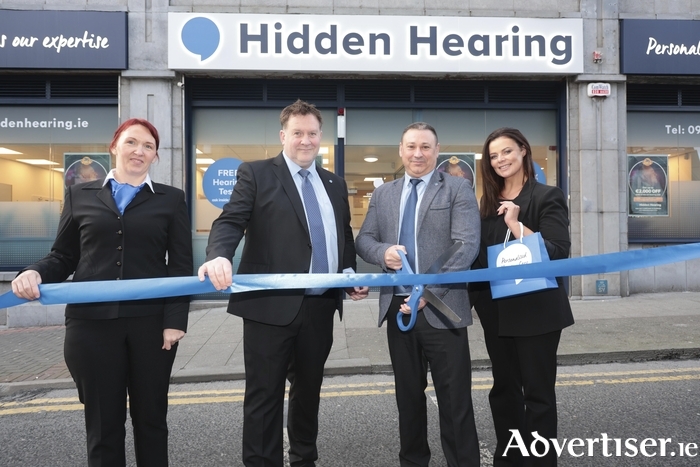 The Hidden Hearing Galway's team: Trisha Hynes, Tim Eacrett, and Robin Smyth with Gift of Hearing recipient, Margaret Monaghan. Photo: Mike Shaughnessy.