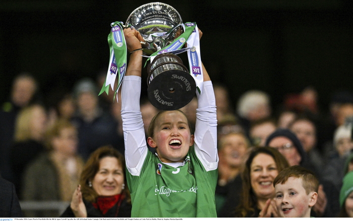 15 December 2024; The Sarsfields captain Laura Ward lifts the Bill and Agnes Carroll Cup after the AIB All-Ireland Senior Camogie Club final match between Sarsfields and Truagh-Clonlara at Croke Park in Dublin. Photo by Stephen Marken/Sportsfile